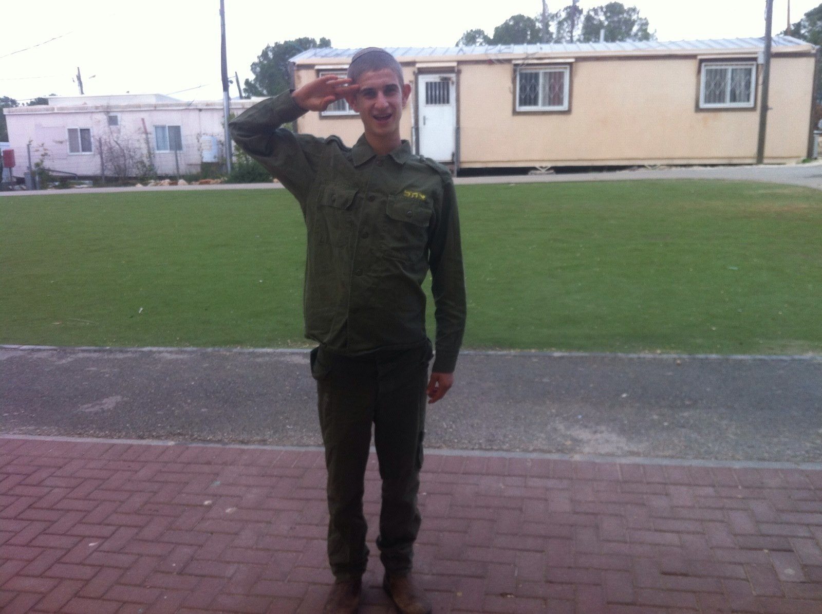IDf soldier with special needs salutes in uniform