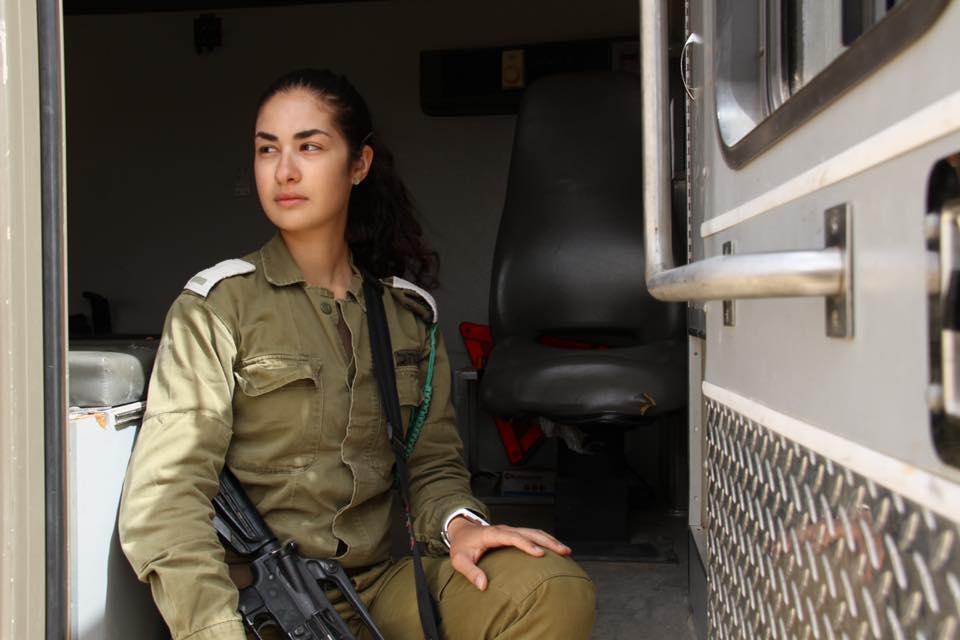 female IDF soldier with gun 