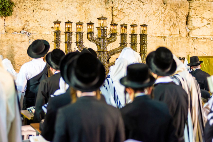 menorah ligfhting at the western wall in israel hanukkah