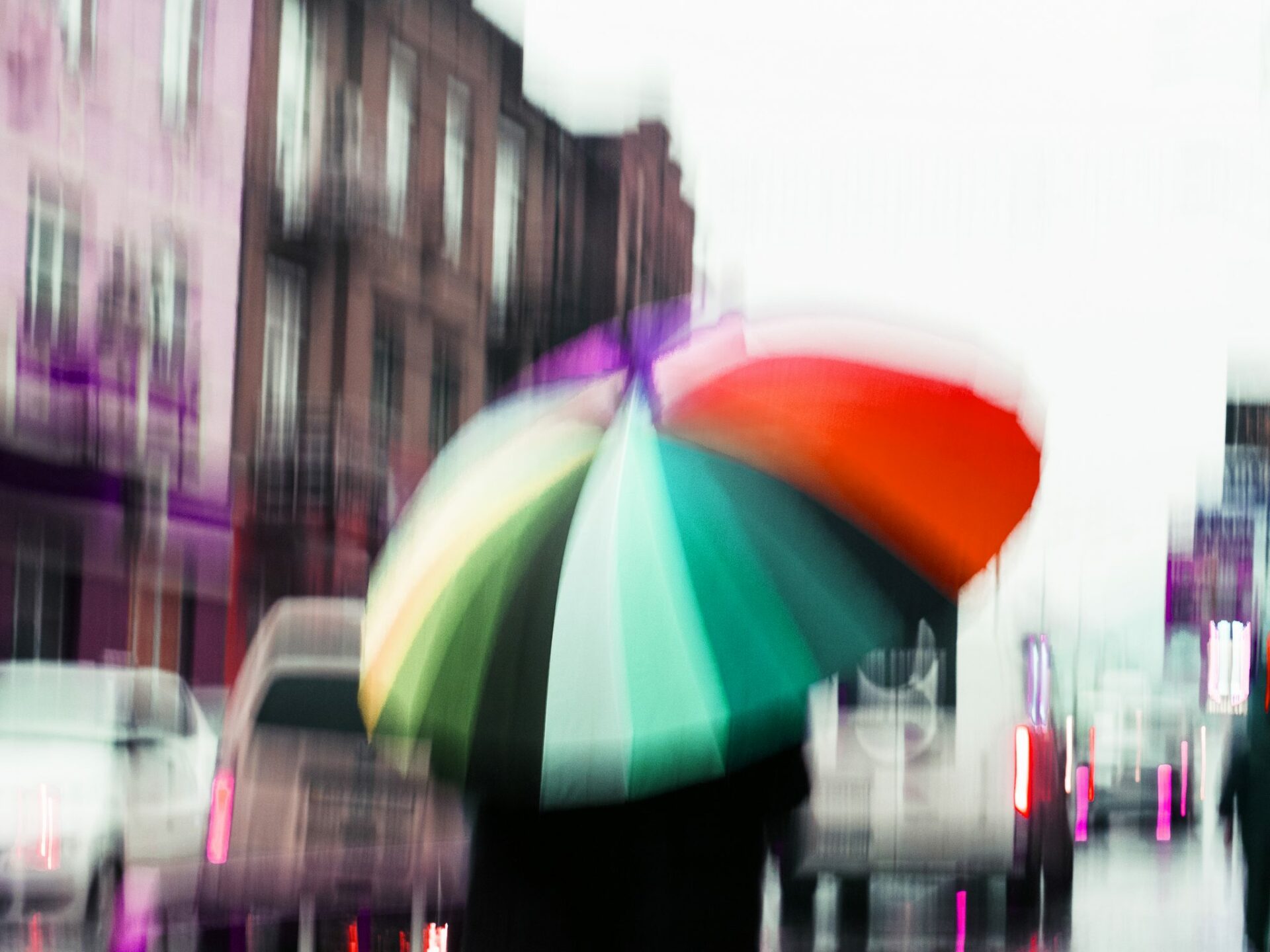 street in a rainy day reflection blur umbrella