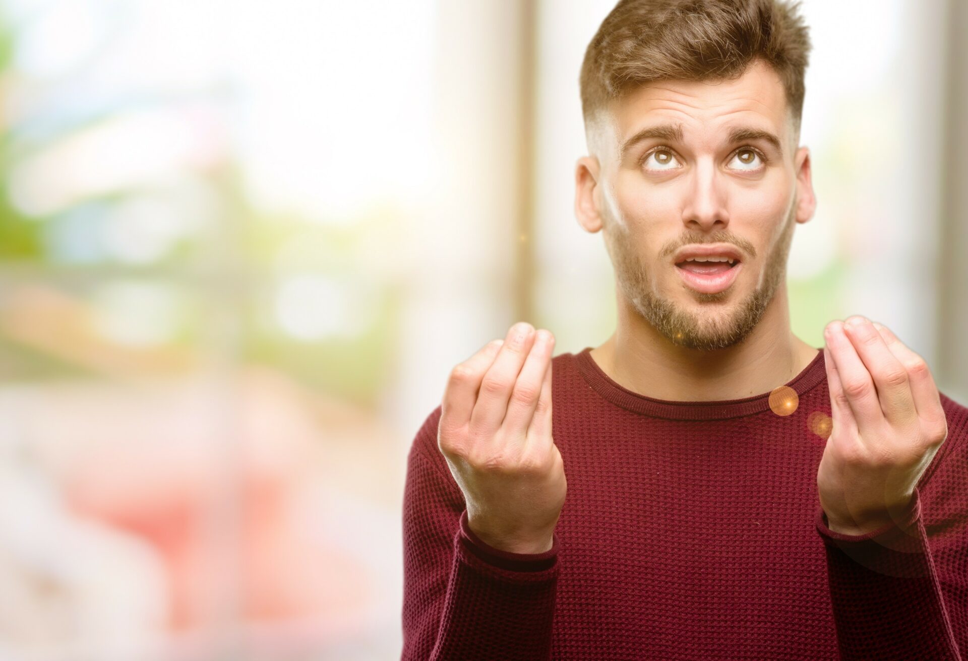 guy doing an italian gesture with his hands and asking for patience 
