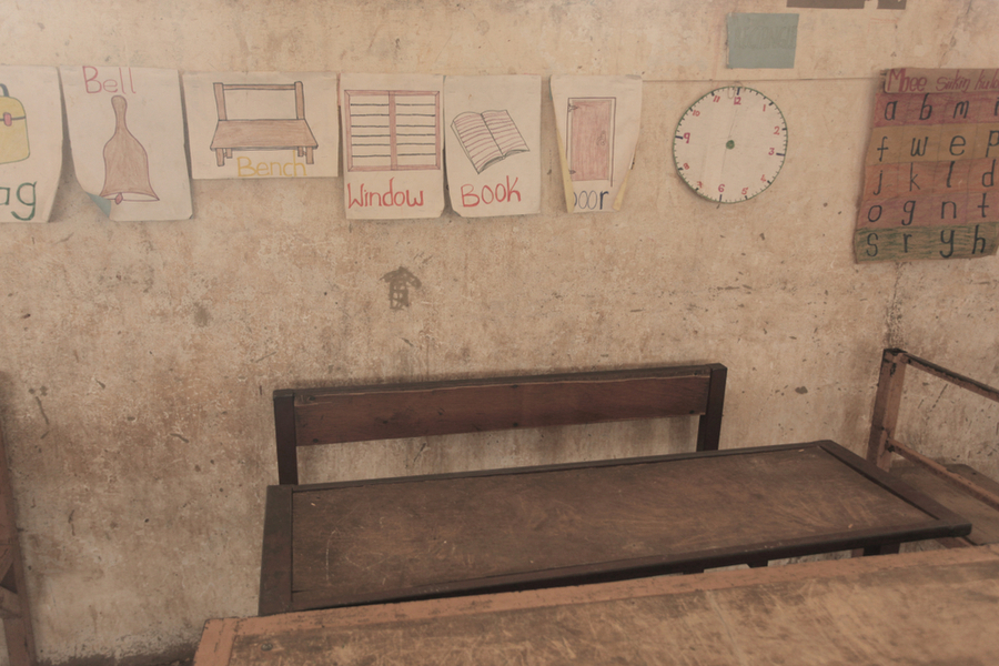 an elementary room showing drawings of objects for children to read to show that in many plces in the world an elementry education is hard to achieve 