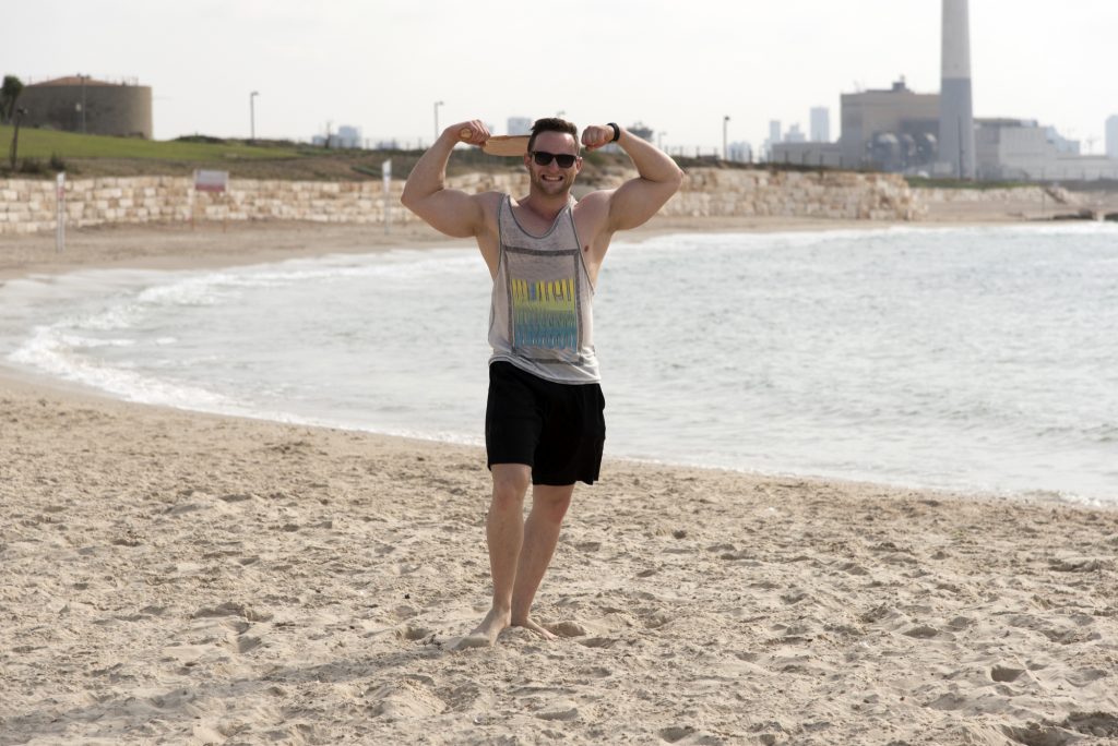 working out on the beaches of israel to get ris of the exis calories accumulated from the jewish holidays and summer vacation