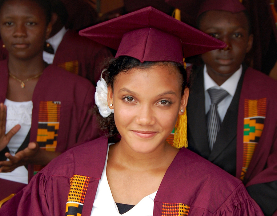 a close up of 3 African high school graduates to convey a new hope for the future when they'll be able to sign up for the university of the people by Shi Reshef 